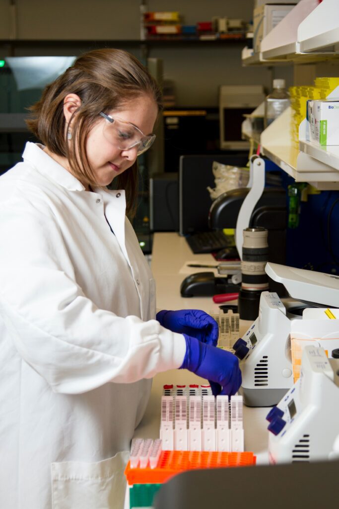 Clinical science research scientist examines blood samples