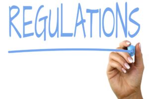 Regulations in Blue Color on a White Background